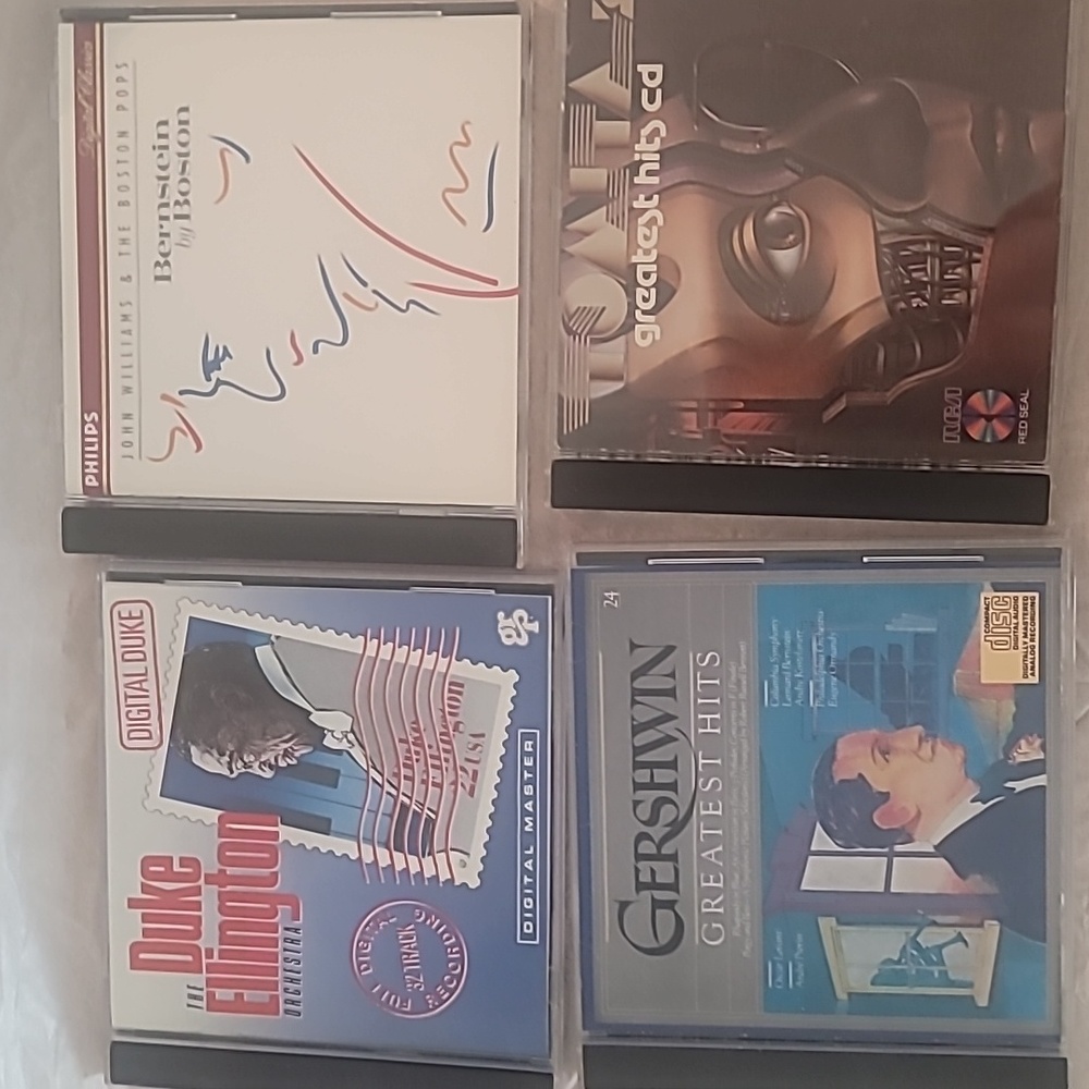 Set of 4 classical and jazz CDs